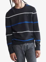 Sweater negro de algodón con rayas horizontales blancas y azules. Tiene cuello redondo y logo de Calvin Klein bordado en el pecho.
