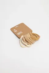 Pack de 12 gomitas de pelo elásticas en tonos beige y crema.