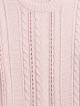 Buzo de algodón negro con cuello redondo, manga larga y tejido de punto con trenzas y calados en el frente.