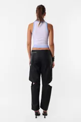 Top de morley color lila, con cuello redondo y sisas anchas.
