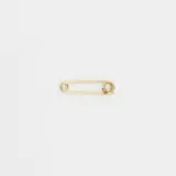 Dije prendedor en forma de imperdible, fabricado en oro amarillo 18k.