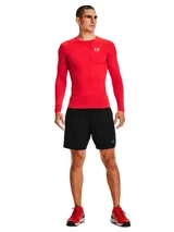 Remera de compresión Under Armour HeatGear de manga larga, color negro con logo blanco en el pecho.