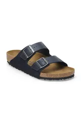Sandalias de dos tiras de cuero sintético en color azul, con suela de corcho.