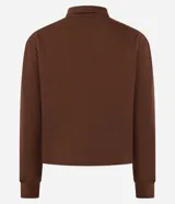 Suéter color crema de algodón y poliéster, con cuello polo, manga larga ajustada y abotonado delantero.