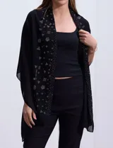 Pashmina negra de gasa con apliques de brillos geométricos.