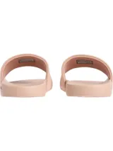 Ojotas rosadas con logo CK en la tira superior.