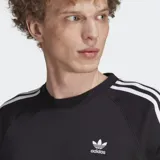 Buzo Adidas Adicolor Classic negro con cuello redondo y mangas largas con tres rayas blancas. Logo del trifolio bordado en el pecho.