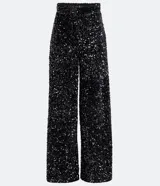 Pantalón largo de lentejuelas negras con forro, corte palazzo y cintura alta.
