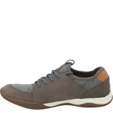 Championes Hush Puppies modelo Space, color celeste con detalles en marrón y suela marrón. Capellada de cuero con cuello de lycra y planta con tecnología GreenFoam® en base a caña de azúcar.