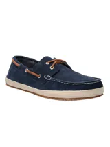 Mocasines náuticos de cuero azul marino con cordones marrones, ojales metálicos y suela de yute.