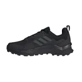 Championes de senderismo Adidas Terrex AX4 GORE-TEX, color negro. Cuentan con membrana GORE-TEX impermeable y suela de caucho Continental para mayor agarre.