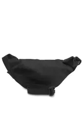 Riñonera Jansport modelo Fifth Avenue, color azul claro, con cierre principal y bolsillo frontal con cierre.