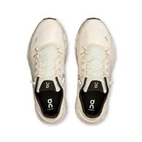 Championes de running On Cloudtilt 1, color crema con detalles en negro y logo plateado.