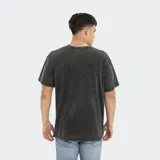 Remera de hombre Reef, corte oversize, color marrón con efecto gastado.