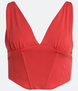 Blusa corta sin mangas color rojo, con escote en V y diseño tipo corset.