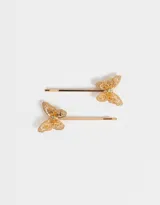 Set de dos horquillas doradas para el pelo con apliques de mariposas caladas y strass.