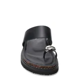 Sandalias negras con estampado animal print, con plataforma plana y tira para el dedo pulgar con detalle metálico plateado.