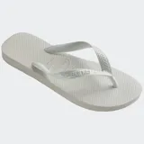 Ojotas Havaianas Top color blanco, con suela de goma y tiras con diseño de espiga.