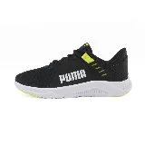Championes Puma FTR Connect negros con detalles en amarillo flúor y suela blanca.