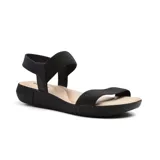 Sandalias bajas color salmón con tiras elásticas y suela blanca.