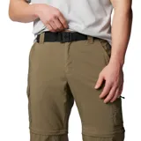Pantalón largo convertible en short, color caqui, de corte recto y tiro medio. Cuenta con bolsillos laterales con cierre, bolsillos cargo con velcro y cintura parcialmente elástica con cinturón removible.