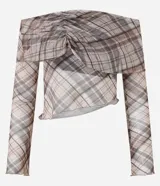 Blusa de tule con estampado de cuadros, escote hombro a hombro, mangas largas acampanadas y canesú fruncido.