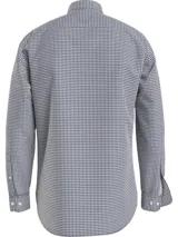Camisa Tommy Hilfiger de corte regular, confeccionada en algodón orgánico Oxford con diseño de cuadros Vichy. Presenta cuello con botones, puños redondeados con dos botones y logo de Tommy Hilfiger bordado en el pecho.