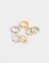 Set de seis anillos de metal con baño plateado y dorado, de diferentes diseños.