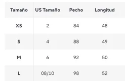 Chaleco marrón de gamuza sintética con tachas doradas.