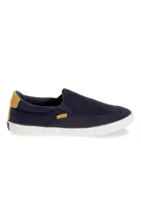 Championes de tela azul marino sin cordones, con suela blanca y detalle amarillo en el talón.