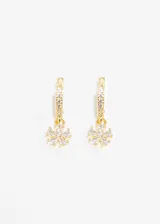 Aros de baño en oro 18k con dije de flor de zirconias, diseño elegante y hipoalergénico.