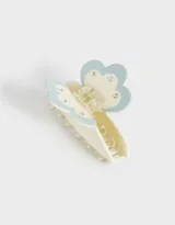 Broche para el pelo con forma de pinza, color crema con aplique de nube celeste.
