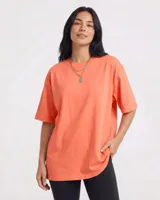 Remerón oversize de manga corta, color coral, confeccionado en algodón.