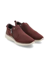 Zapatillas de mujer color bordó, sin cordones, con cierre lateral de cremallera y suela blanca.