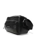 Bandolera Bottero de cuero color marrón caramelo, con correa de tela ajustable.