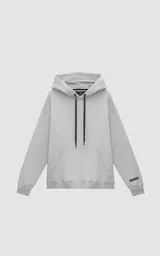 Hoodie gris de frisa premium con capucha ajustable, corte oversize, cintura y puños elastizados.