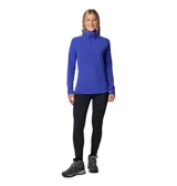 Buzo polar celeste de mujer, marca Columbia, modelo Glacial IV. Cuenta con cuello alto blanco con cierre de media cremallera.
