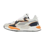 Championes Puma RS-Z Outline, color blanco con detalles en azul marino y naranja.
