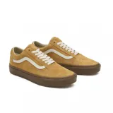 Zapatillas de lona color amarillo con detalles en blanco y suela de goma.