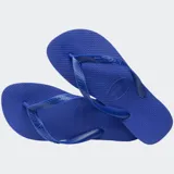 Ojotas Havaianas Top color blanco, con suela de goma y tiras con diseño de espiga.