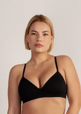 Soutien triangular negro de microfibra sin costuras, con copa soft preformada, sin aro y breteles regulables.