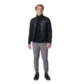 Pantalón de jogging negro con logo de Columbia en blanco en el muslo.