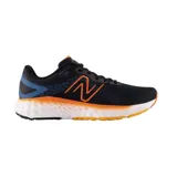 Championes de running New Balance Fresh Foam Evoz, color negro con detalles en azul y naranja.
