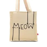 Bolso tipo tote de lona color beige con estampado de dos gatos negros y la palabra 'Meow'.