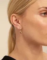 Charm de piercing en forma de corazón, bañado en plata con aleación de metales.
