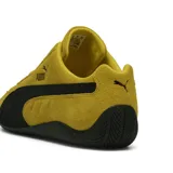 Championes Puma Speedcat OG amarillos con detalles en negro, confeccionados en gamuza.