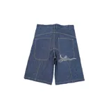 Jort (pantalón corto ancho y largo) de algodón felpa, color negro, con tiro medio y bolsillos delanteros y traseros.