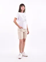 Remera lila con estampado frontal con la frase "Gracias por nada".