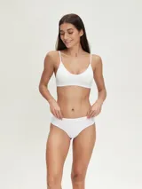 Pack de tres colaless de algodón en color gris con cintura elástica blanca.