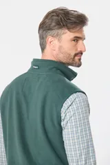 Chaleco polar azul con cierre frontal, diseñado para mayor comodidad y abrigo.